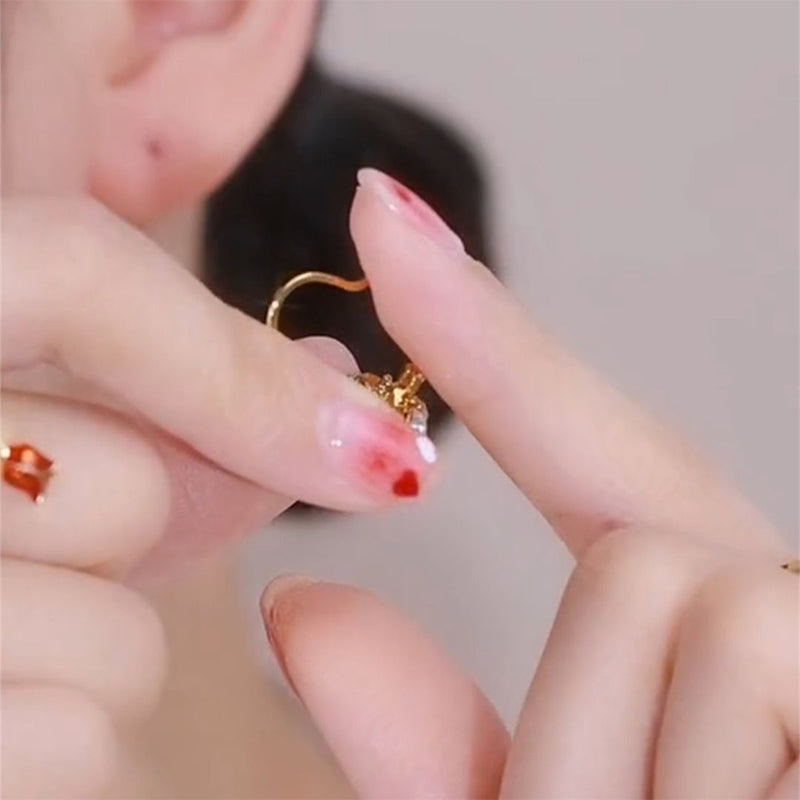Boucles d'oreilles élégantes en or pour femmes, ornées de pierres précieuses et de cristaux