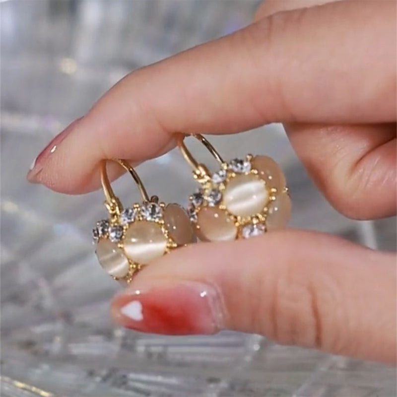 Boucles d'oreilles élégantes en or pour femmes, ornées de pierres précieuses et de cristaux